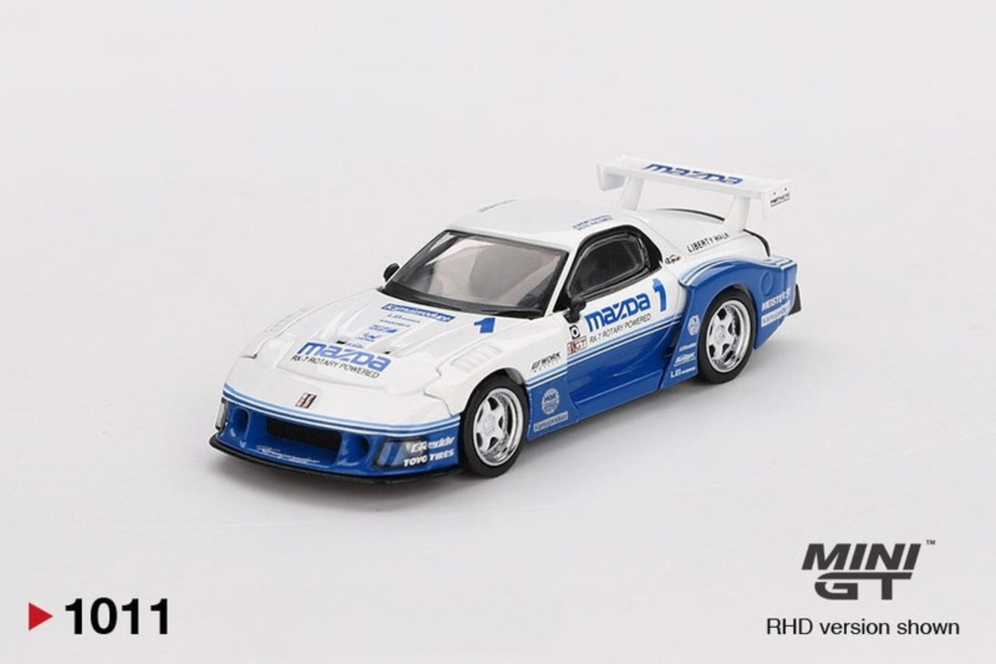 Model car with Mazda branding on a white background, featuring the MINI GT logo.