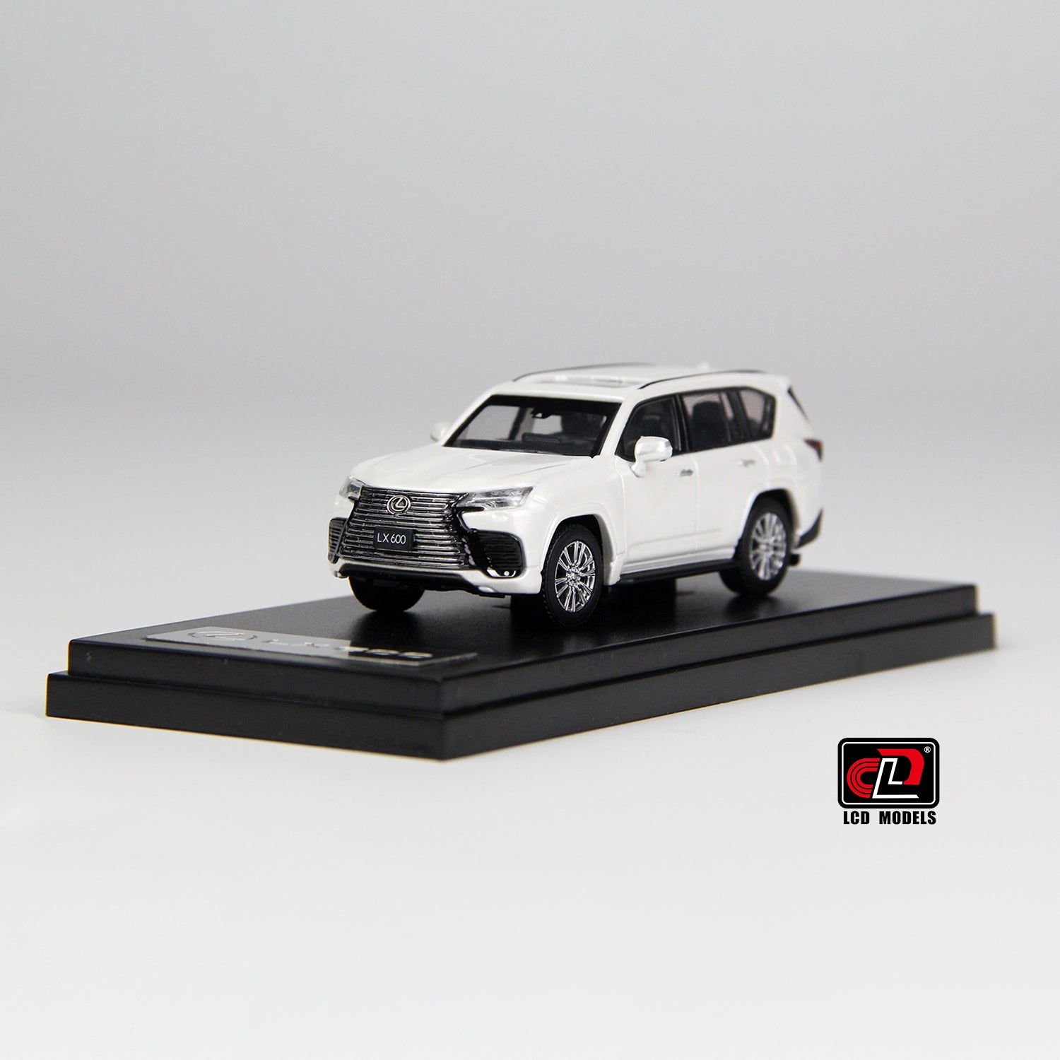 front and side perspective view of LX600 White LCD 1:64 scale model car