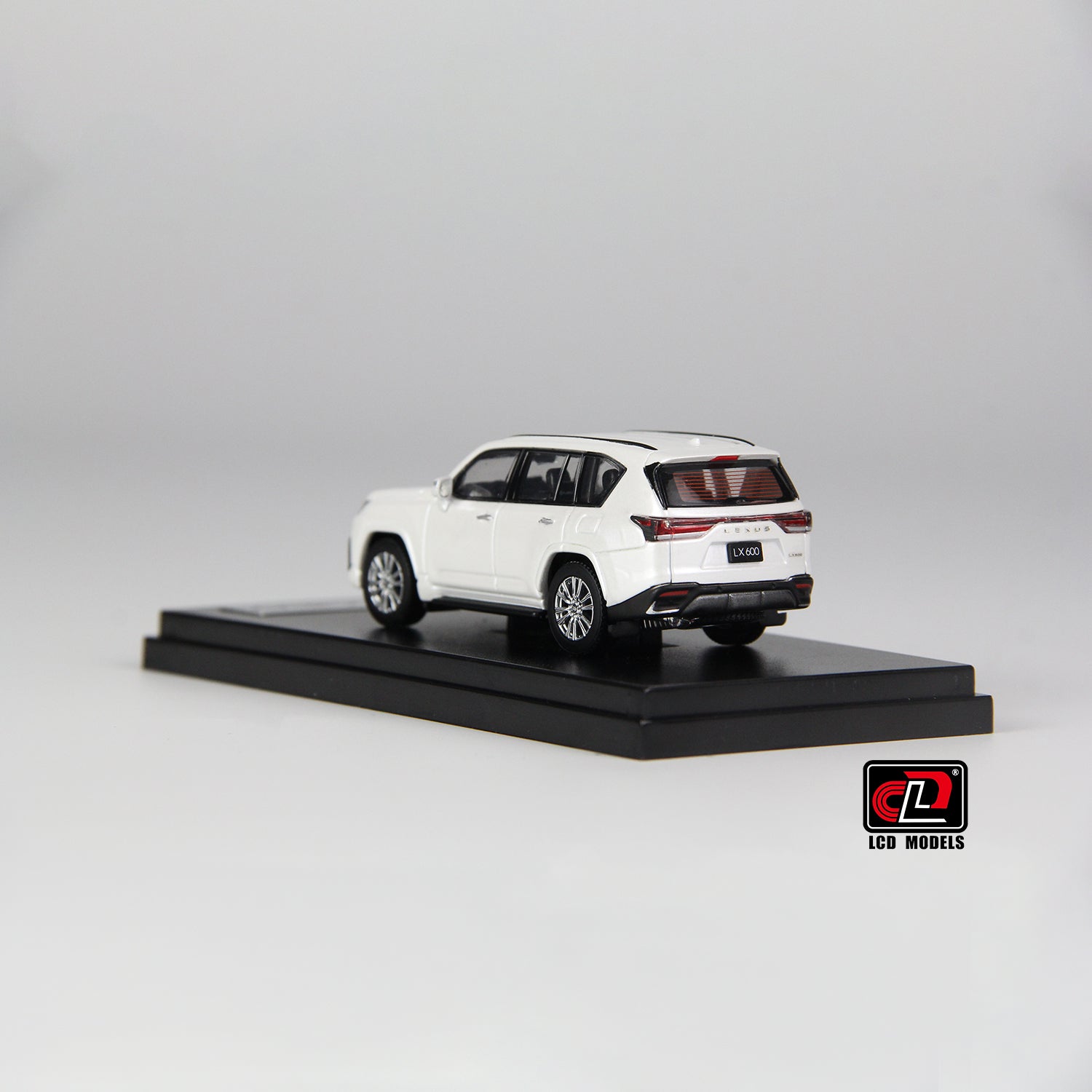 back and side perspective view of front and side perspective view of LX600 Silver LCD 1:64 scale model car