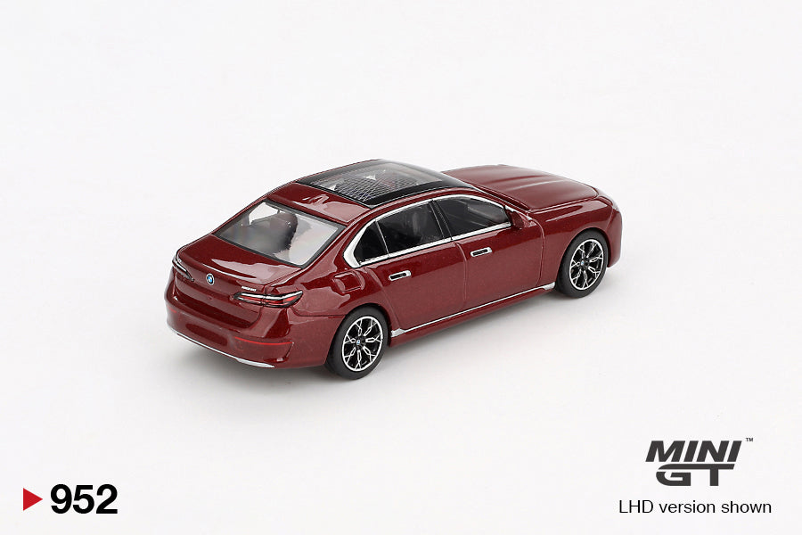 back perspective view of BMW i7 xDrive60 Aventurin 1:64 scale model car - Mini GT