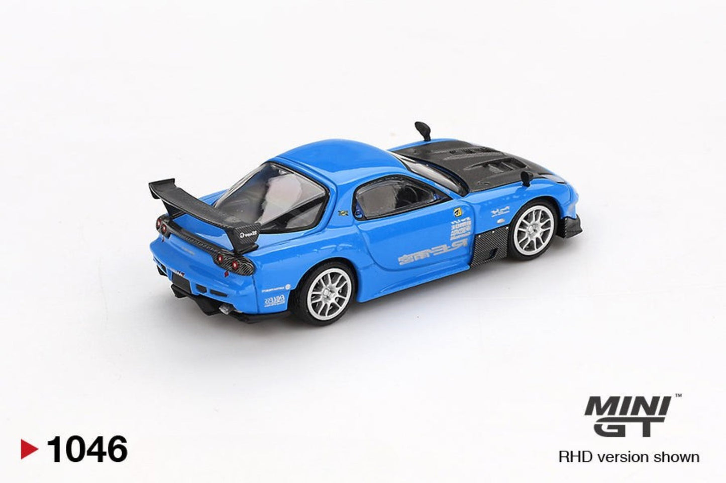 Back view of Mazda RX-7 RE-Amemiya 20B NA 3ROTOR-7 “Ama-san Go” 1:64 scale model car - Mini GT