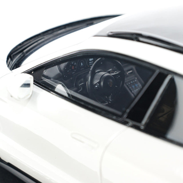 Steering closeup view Porsche Taycan Turbo S Cross Turismo 1:18 scale model car by GT Spirit Product code CLDC033