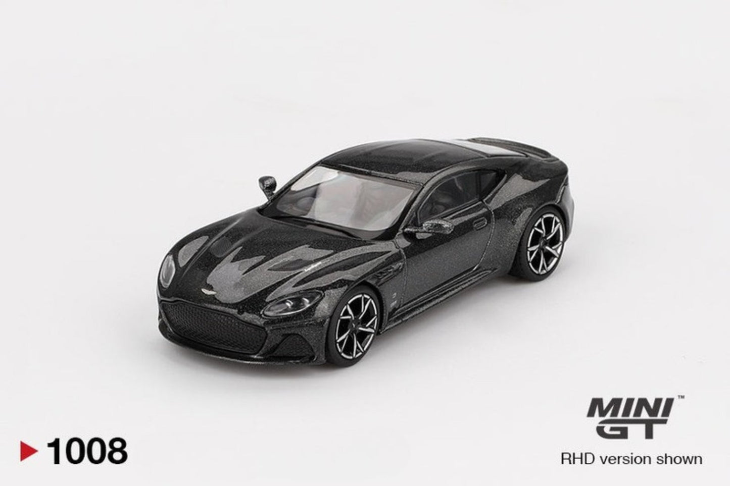 Black model Aston Martin DBS 007 car on a white background with 'MINI GT' branding.
