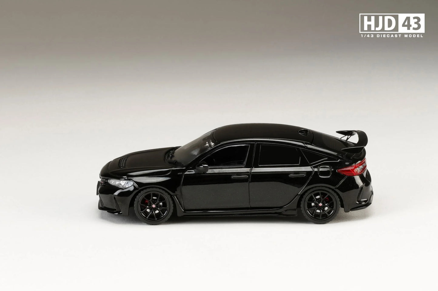 side view of Honda Civic Type R (FL5) Racing Black Package Crystal Black Pearl 1:64 Scale Model Car – Hobby Japan (Product Code: HJD431004BK)