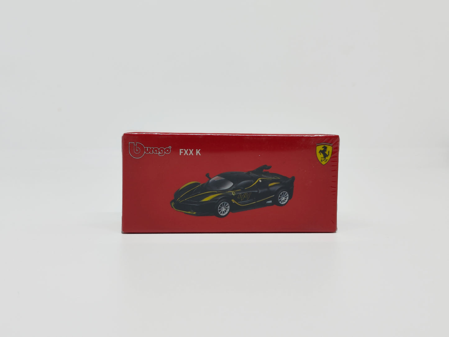 Box of Ferrari Fxxk Black 1:64 scale model car - Bburago