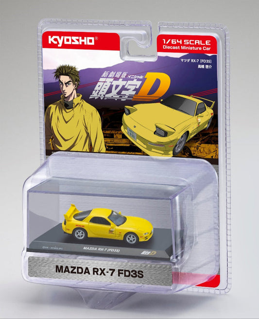 A 1:64 scale model of a yellow Mazda RX-7 (FD3S), packaged in a clear plastic display case with a man in a yellow jacket on the packaging, and the text 'Initial D' and 'MAZDA RX 7 FD3S' visible.