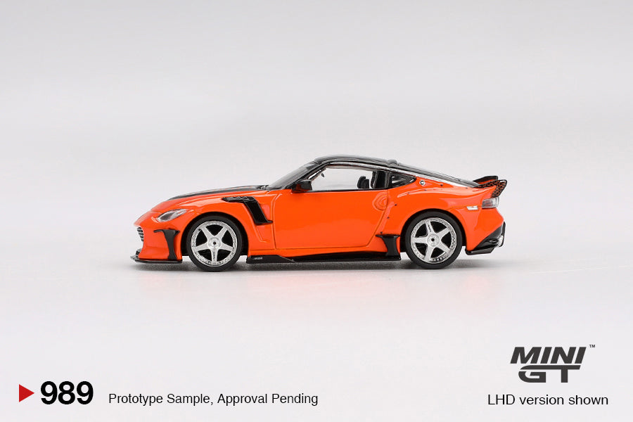 side view of Nissan Z VeilSide FFZ400 Orange 1:64 scale model car - Mini GT