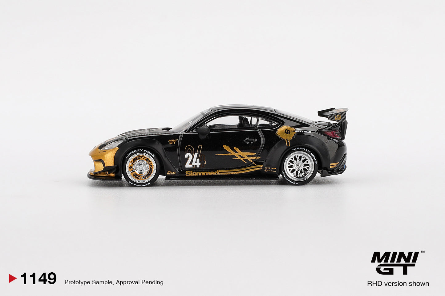 side view of Toyota GR86 LB★Nation Black / Gold 1:64 scale model car - Mini GT