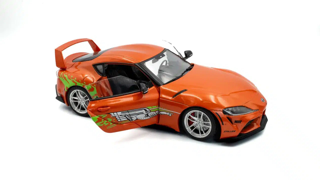 Top front perspective view of Toyota GR Supra Fast & Furious Tribute Orange 2024 1:18 scale model car - Solido