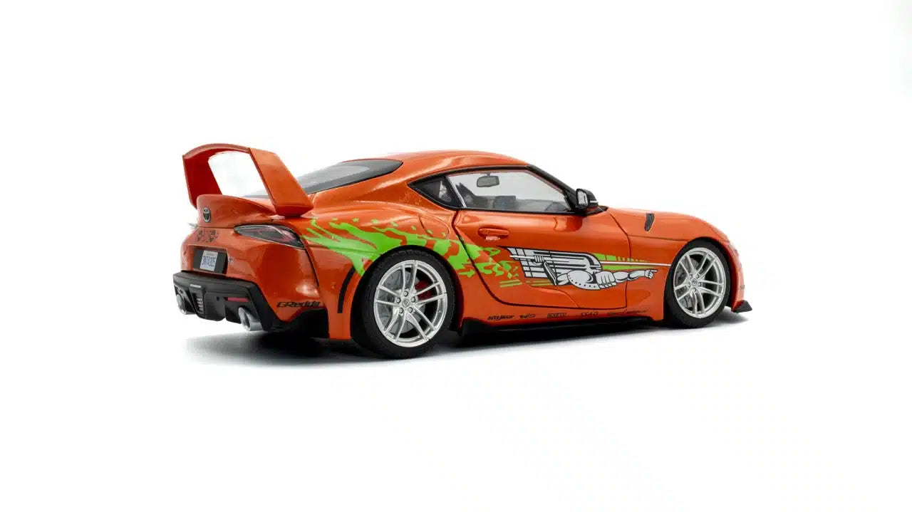 Back perspective view of Toyota GR Supra Fast & Furious Tribute Orange 2024 1:18 scale model car - Solido