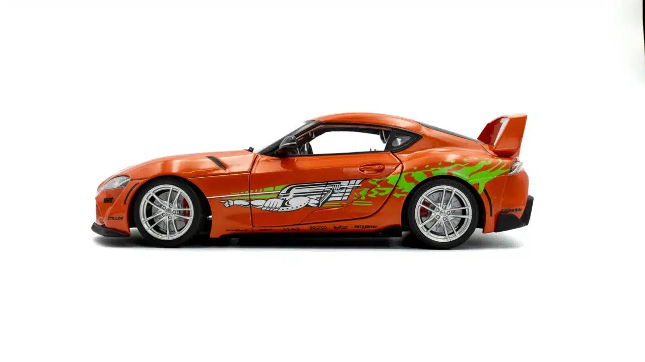 Side 2 view of Toyota GR Supra Fast & Furious Tribute Orange 2024 1:18 scale model car - Solido
