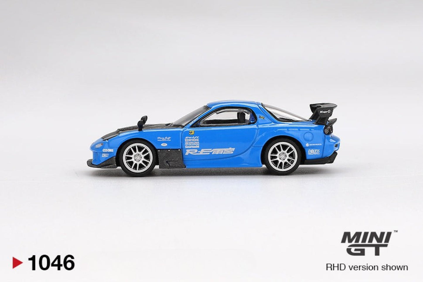 side of Mazda RX-7 RE-Amemiya 20B NA 3ROTOR-7 “Ama-san Go” 1:64 scale model car - Mini GT