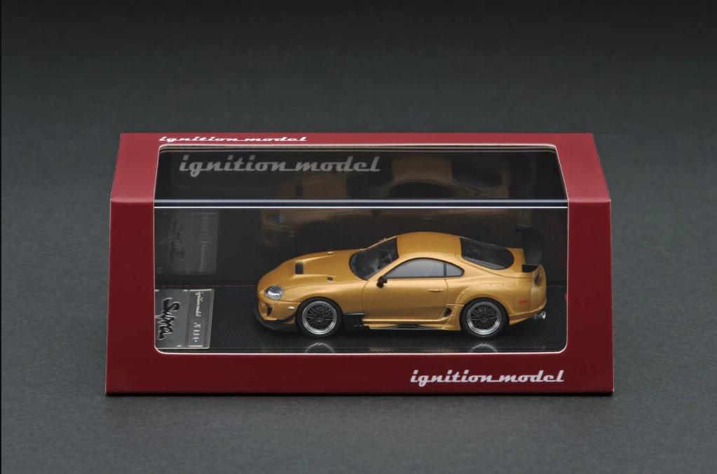 side view of Ignition model 1:64 Toyota Supra (JZA80) RZ with acrylic packaging.