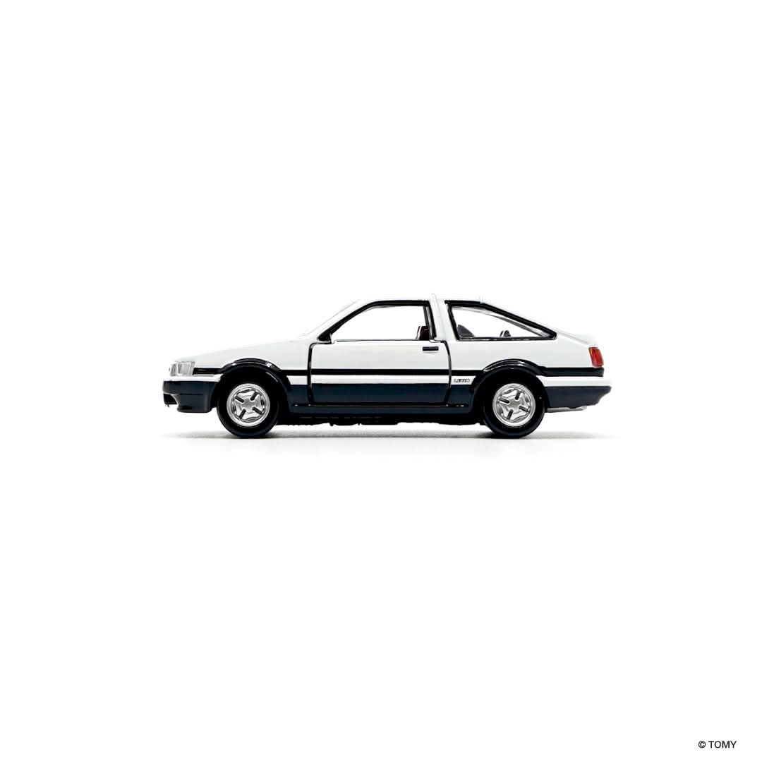 side view of Toyota Corolla Levin white 1st edition 1:64 scale model car - Tomica premium