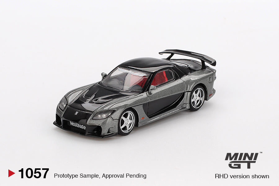 Front perspective view of Mazda RX-7 VeilSide Fortune Grey 1:64 scale model car - Mini GT