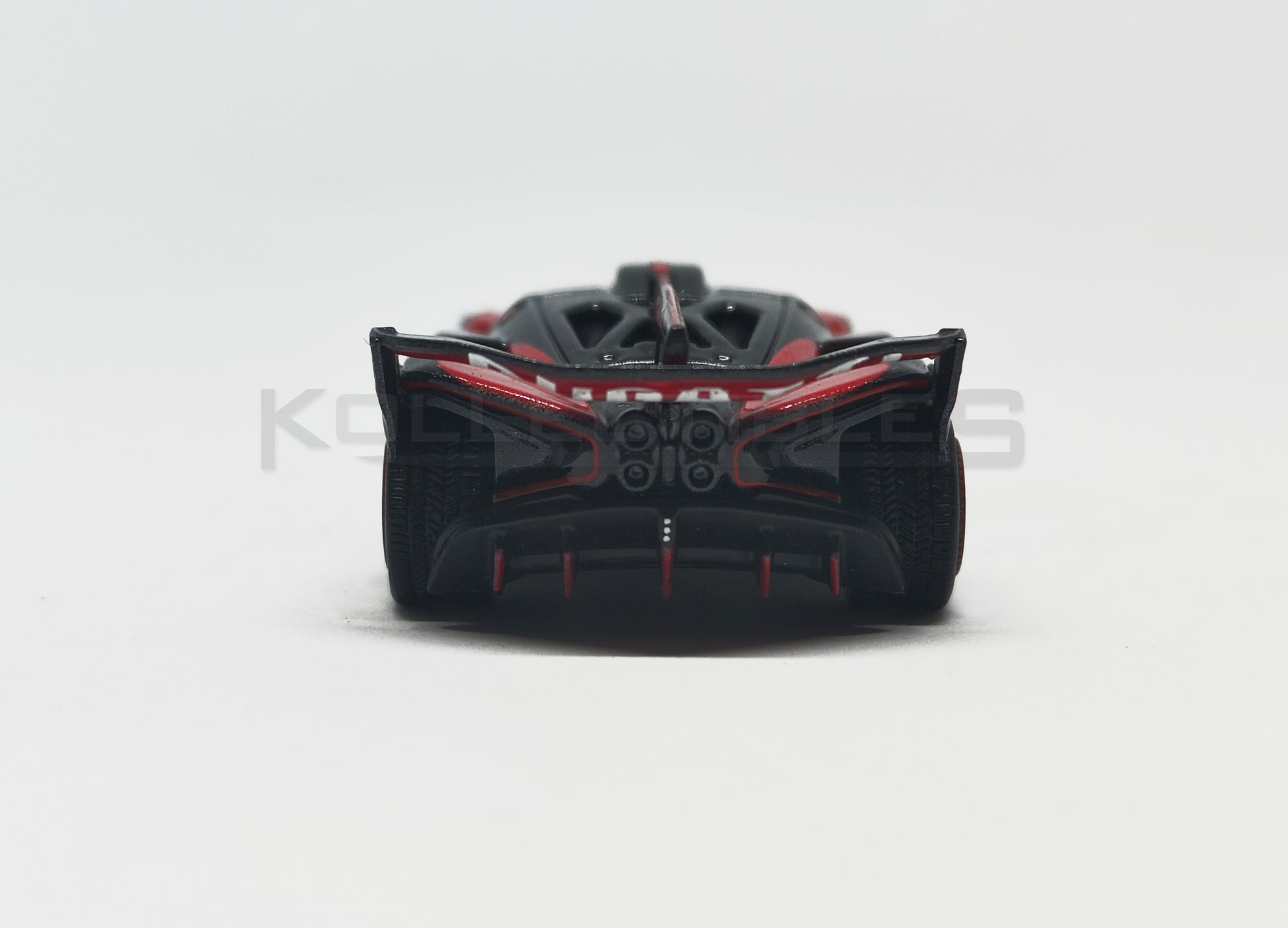 Back view of Bugatti Bolide red and Black 1:64 scale model car - Bburago