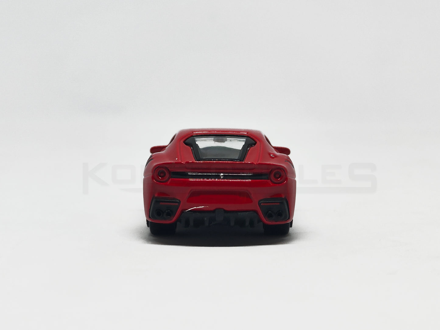 Back view of F12DTF Red 1:64 scale model car 1:64 scale model car - Bburago
