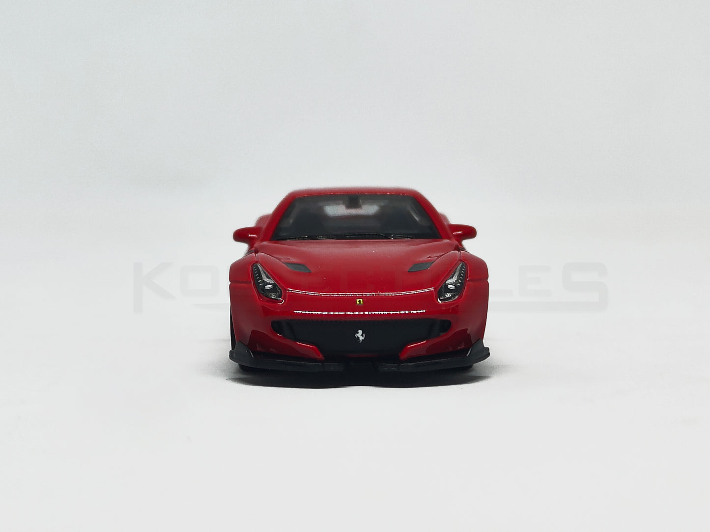 front view of F12DTF Red 1:64 scale model car 1:64 scale model car - Bburago