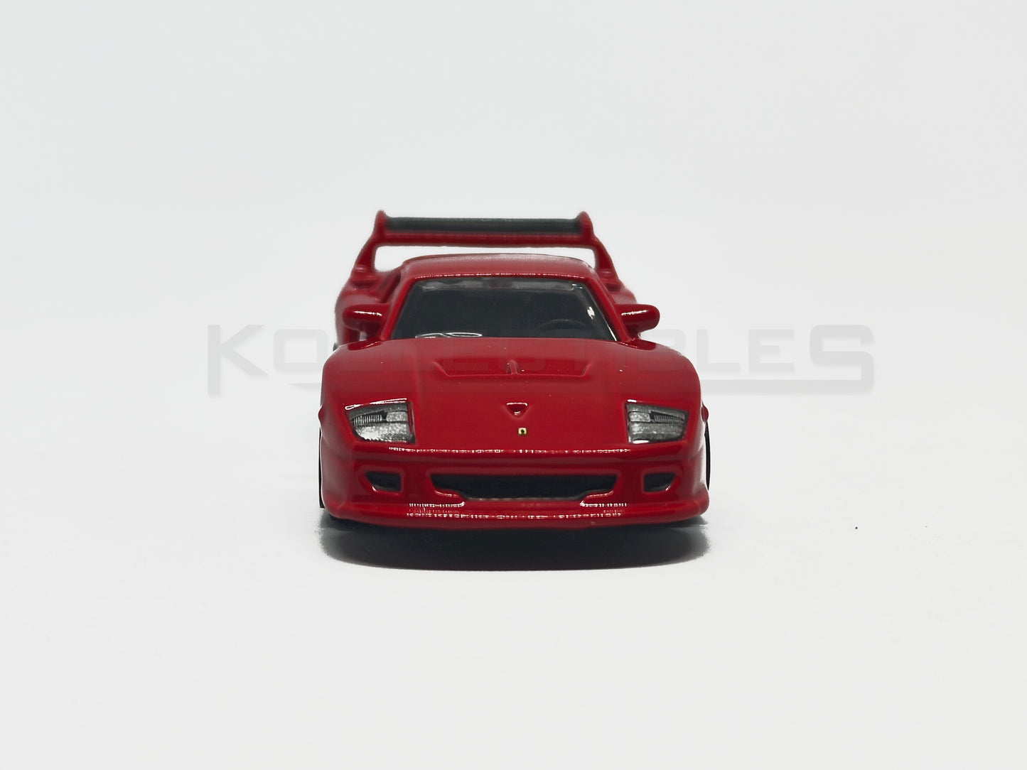 Front view of Ferrari F40 Competizione Red 1:64 scale model car - Bburago