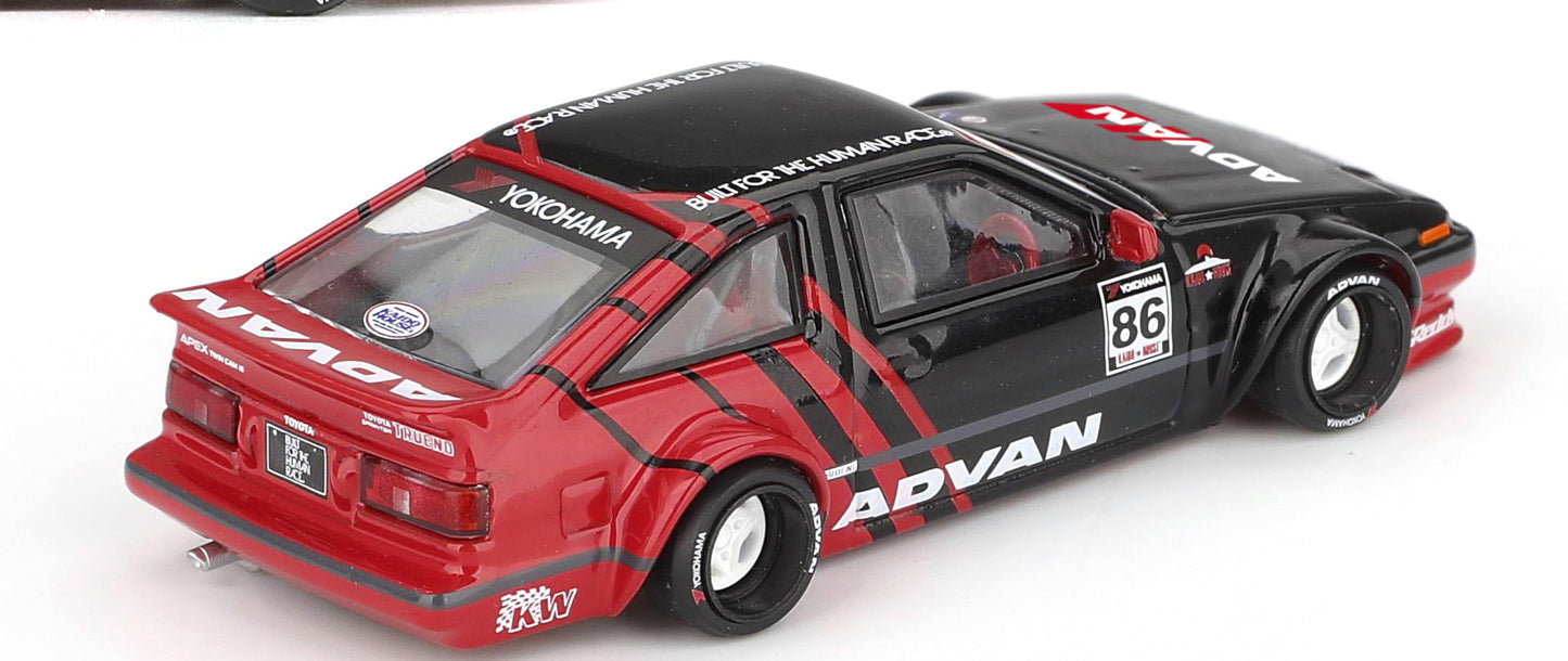 Side profile of Toyota AE86 Sprinter Trueno Kaido ADVAN 1:64 scale model car showing the race number 86 and over-fenders (KHMG0214)