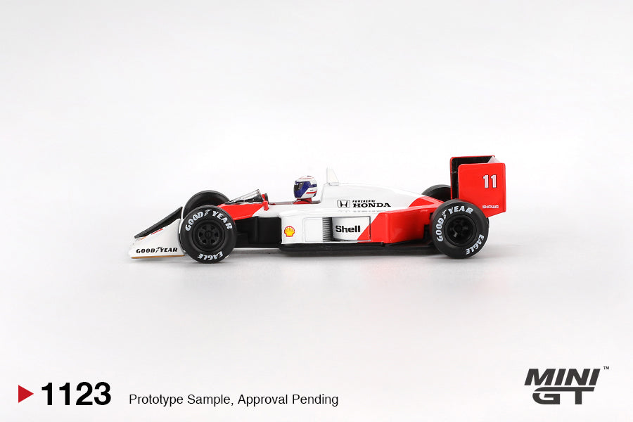 Side profile of McLaren MP4/4 #11 Alain Prost 1988 Japanese Grand Prix 1:64 scale model car with Goodyear Eagle tyres (MGT01123)