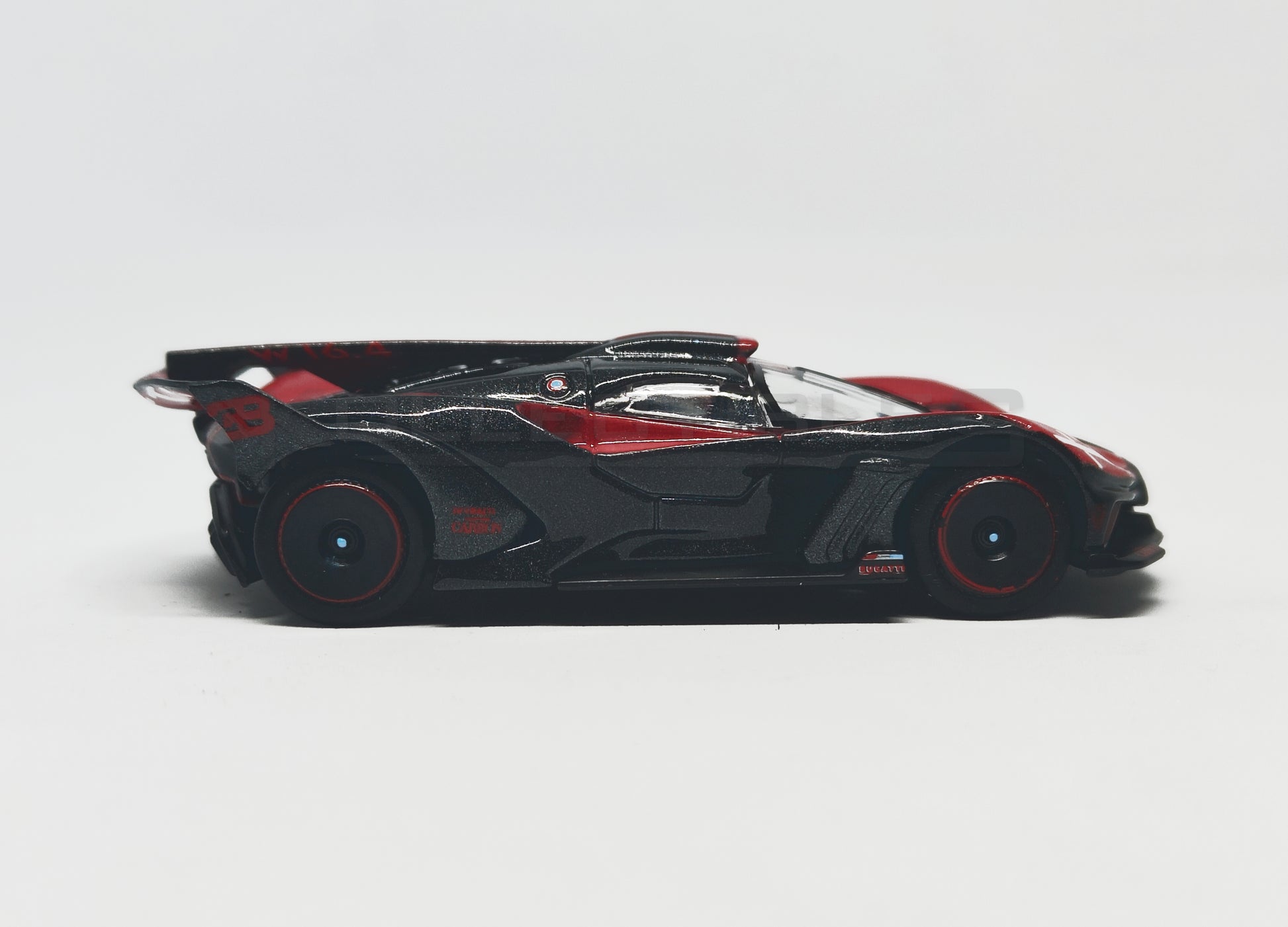 side2 view of Bugatti Bolide red and Black 1:64 scale model car - Bburago