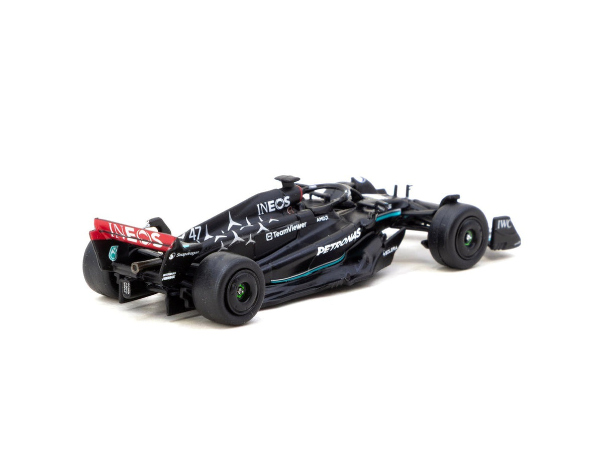 Rear three-quarter view of Mercedes-AMG F1 W14 1:64 diecast showing the Petronas rear wing and unmarked black test tyres (T64G-F064-MS1)