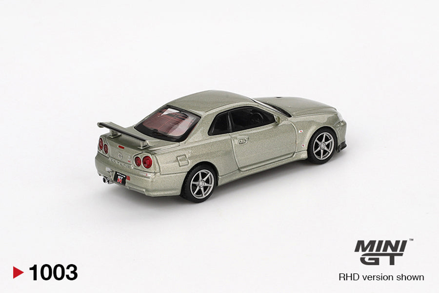 Back perspective view of Nissan Skyline GT-R (R34) V-Spec II Nür Millenium Jade 1:64 scale model car - Mini GT