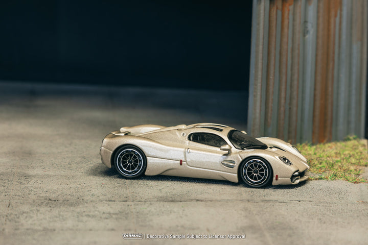back perspective view of Pagani Utopia Rinascimento 1:64 Scale Model Car – Tarmac Works (Product Code: T64G-TL055-BI) places inside a diorama