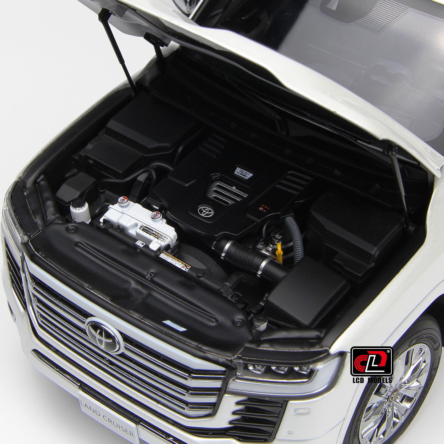 Car engine compartment view of Toyota Land Cruiser White 1:18 scale model car - LCD Models