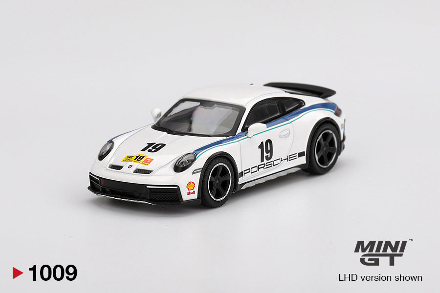 Front perspective view of Porsche 911 Dakar Rally 1974 1:64 scale model car - Mini GT