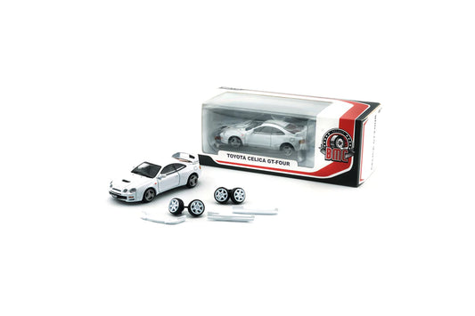 Box and parts of Toyota Celica GT Four White (RHD) 1:64 scale model car - BM creations Product code 64B0419