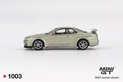 Side view of Nissan Skyline GT-R (R34) V-Spec II Nür Millenium Jade 1:64 scale model car - Mini GT