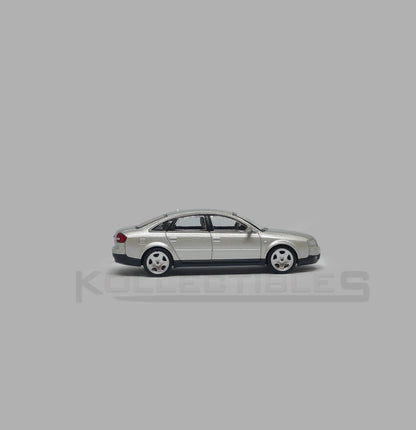 Side 2 view of Audi A6 second generation (C5) metallic silver 1:64 scale model car - Xcartoys x Poprace