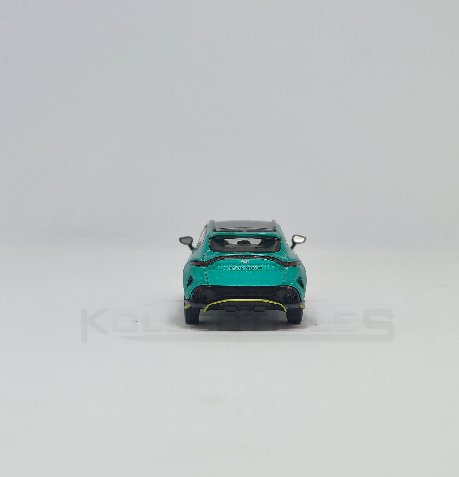 Back view of Aston martin DBX Green 1:64 scale model car - Xcartoys x Poprace