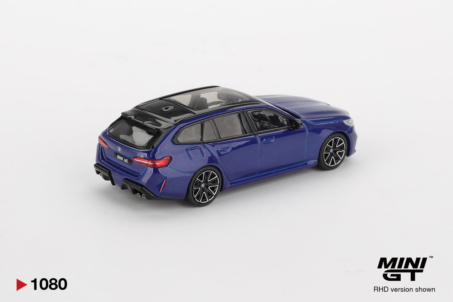 back perspective view of BMW M5 Touring Marina Bay Blue Metallic 1:64 scale model car - Mini GT