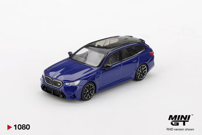 Front perspective view of BMW M5 Touring Marina Bay Blue Metallic 1:64 scale model car - Mini GT