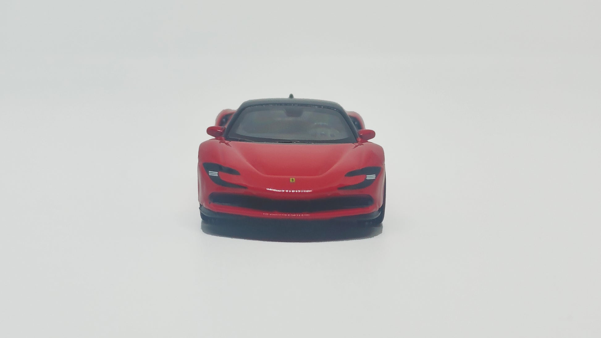 front vew of Ferrari SF90 Red 1:64 scale model car - Bburago