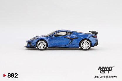 Side view of Chevrolet Corvette Z06 2023 Elkhart Lake Blue Metallic 1:64 scale model car by Mini GT