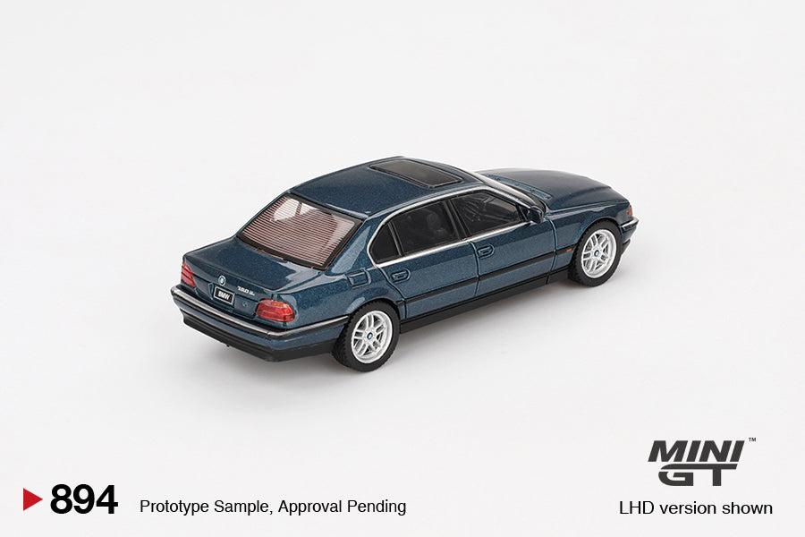 back perspective view of BMW 750IL Sorrento Blue Metallic 1:64 scale model car - Mini GT