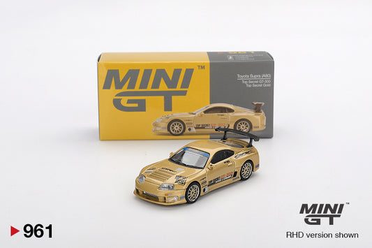 Box of Toyota Supra (A80) Top Secret GT-300 Top Secret Gold 1:64 scale model car - Mini GT