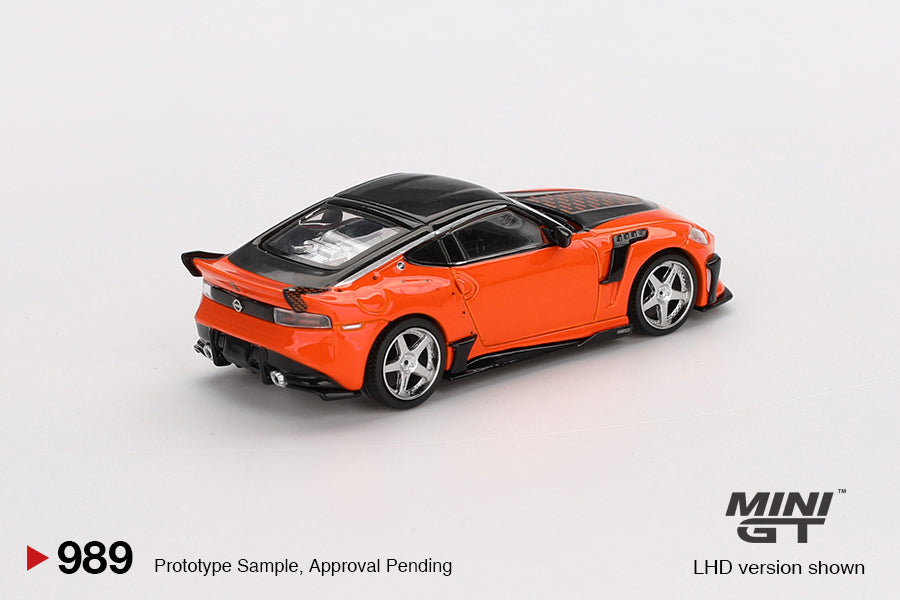 Back perspective view of Nissan Z VeilSide FFZ400 Orange 1:64 scale model car - Mini GT