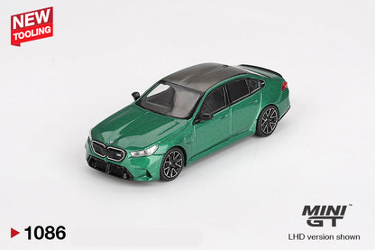Front perspective view of BMW M5 Isle of Man Green Metallic 1:64 scale model car - Mini GT