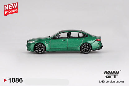 side view of BMW M5 Isle of Man Green Metallic 1:64 scale model car - Mini GT