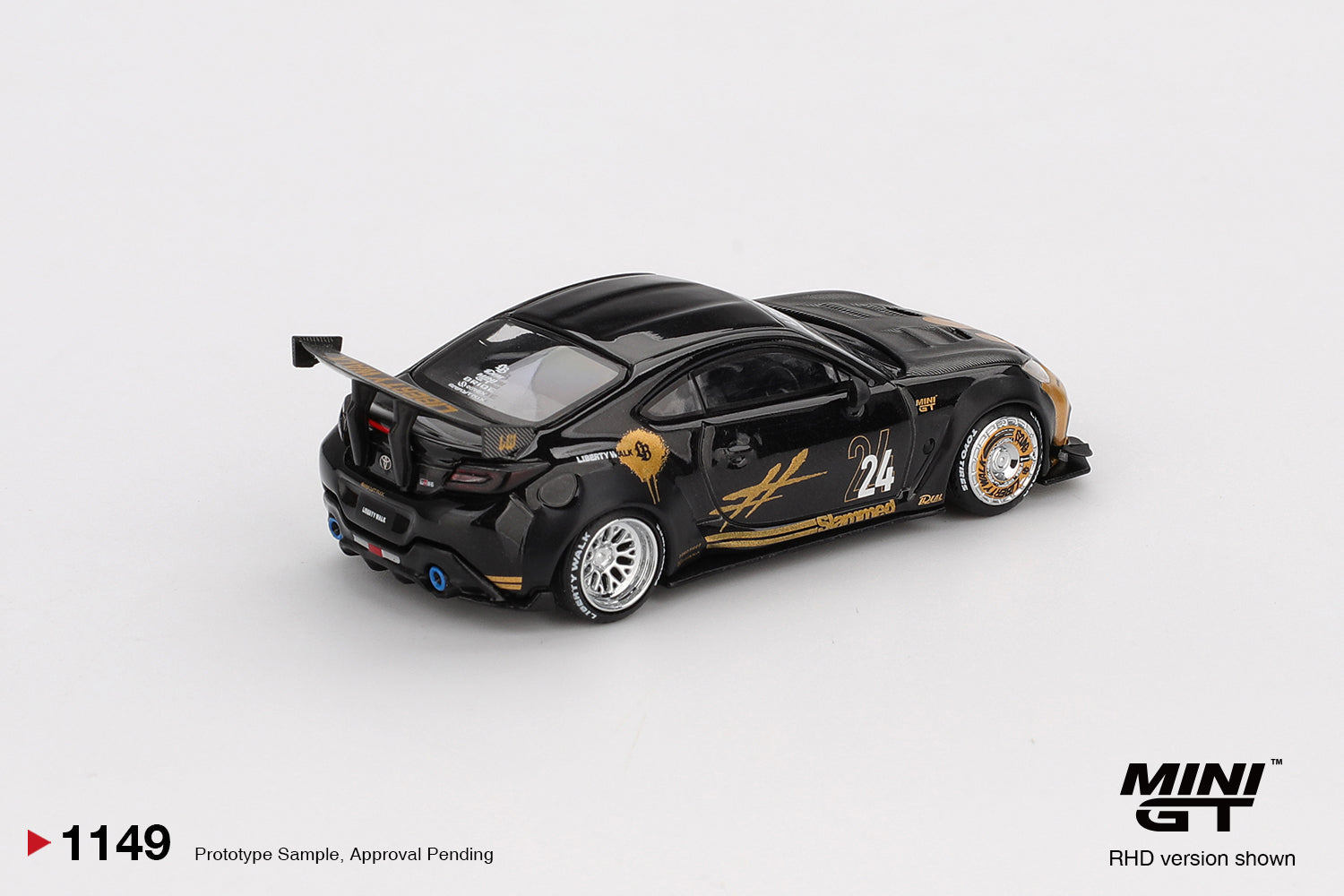 back perspective view of Toyota GR86 LB★Nation Black / Gold 1:64 scale model car - Mini GT