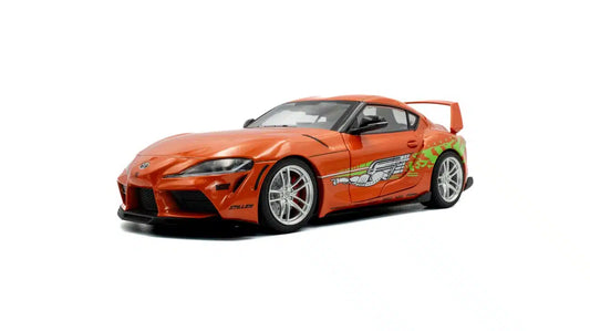 Front perspective view of Toyota GR Supra Fast & Furious Tribute Orange 2024 1:18 scale model car - Solido