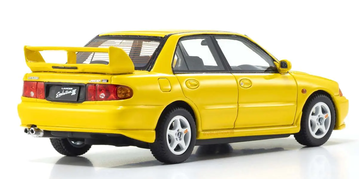 perspective view of both the back and the side Kyosho 1:43  Mitsubishi Lancer Evolution III yellow