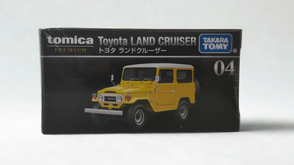 Toyota Land Cruiser yellow 1:64 scale model car - Tomica Premium