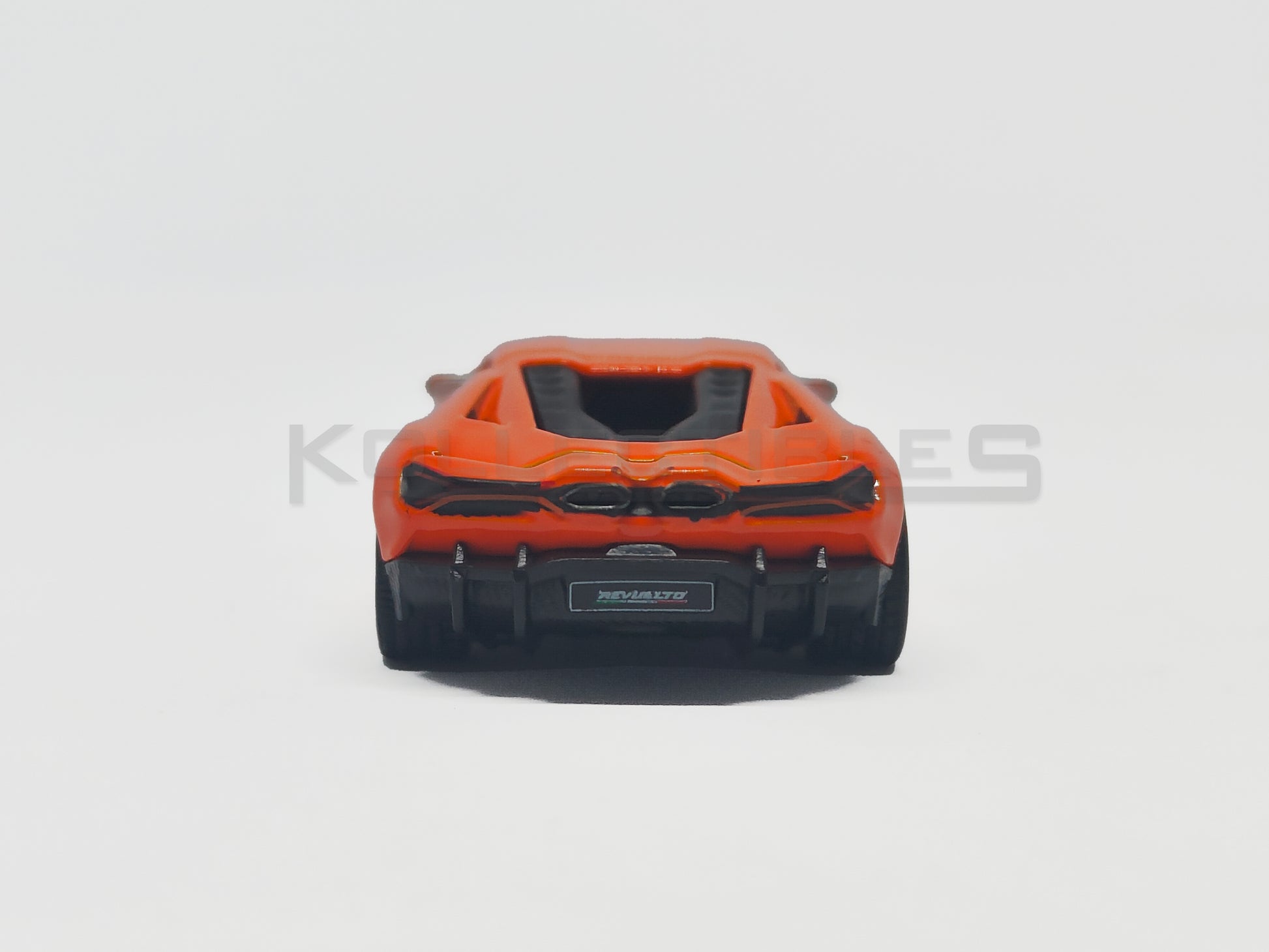 back of Lamborghini Revuelto Orange 1:64 scale model car - Bburago