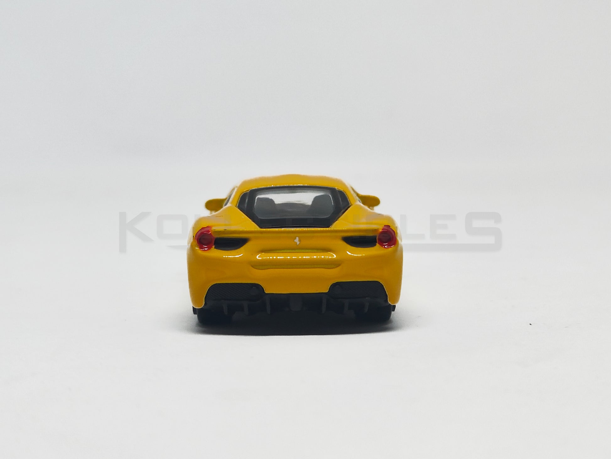 Back view of Ferrari 488GTB Yellow 1:64 Scale model car - Bburago